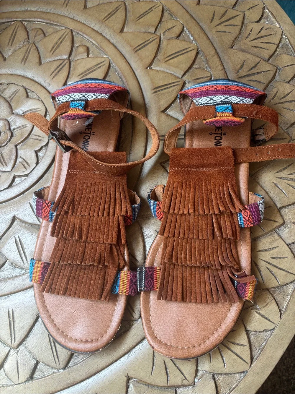 Minnetonka Fringed Suede Women’s Sandals with Woven Accents